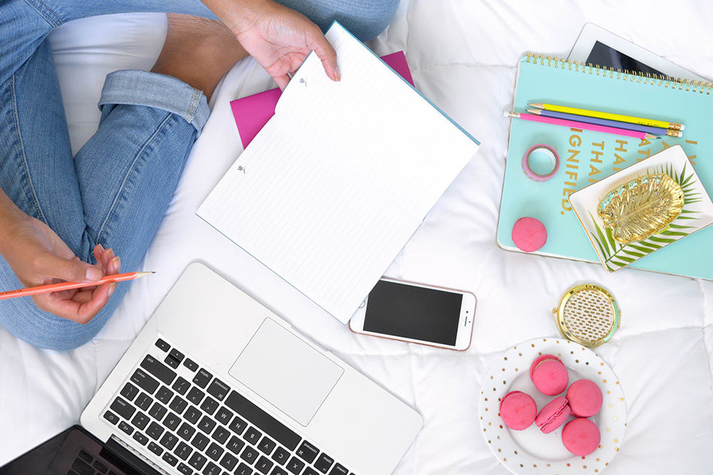 laptop and colourful notebooks